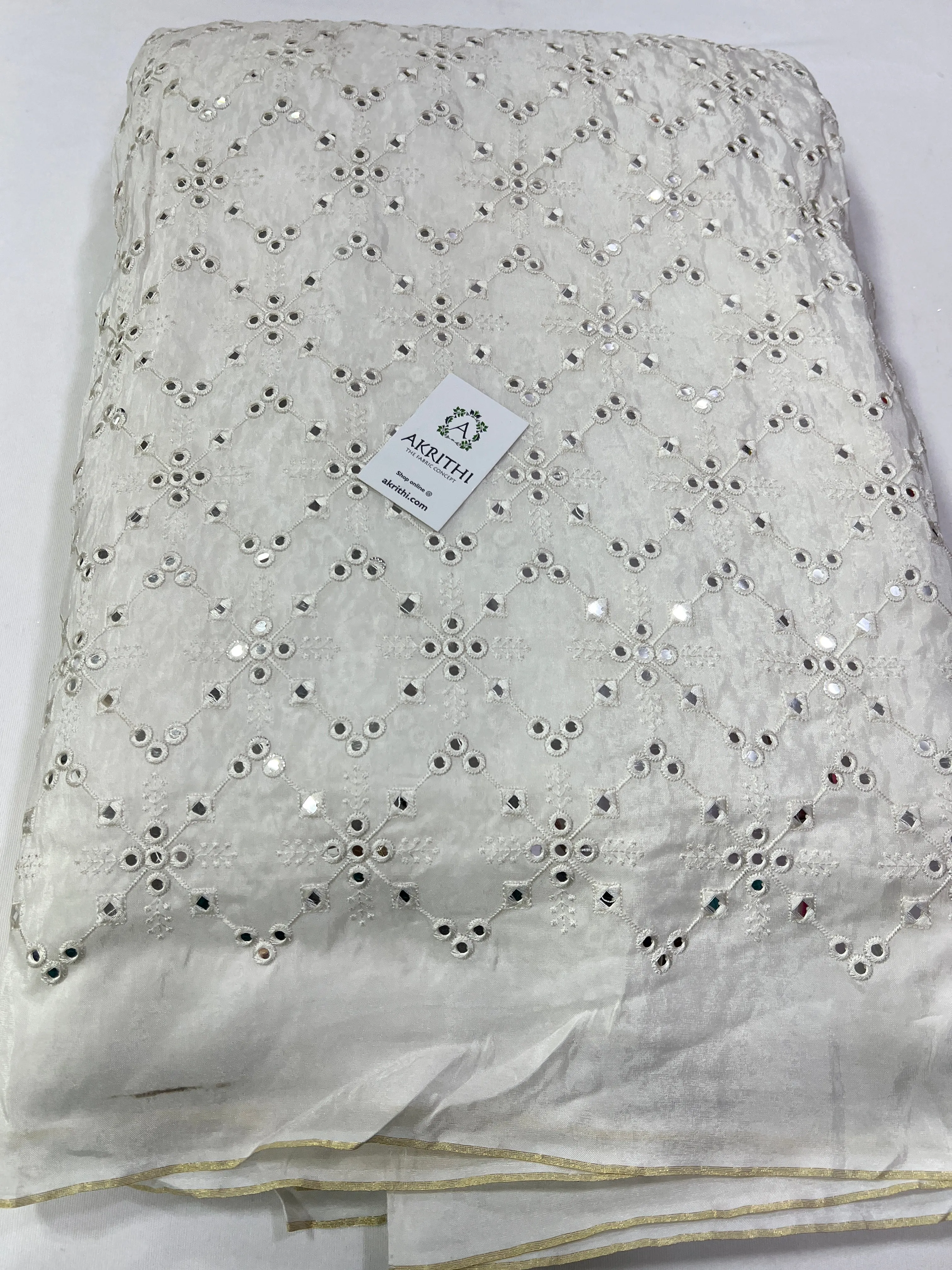 Mirror Embroidery on Half white semi silk fabric