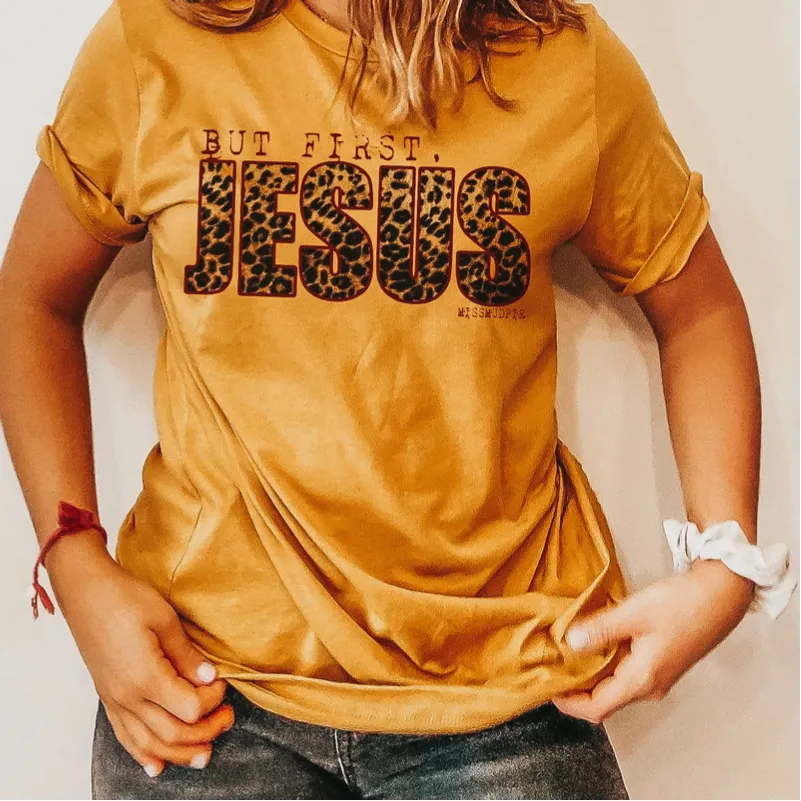 Online Exclusive | But First, Jesus Short Sleeve Graphic Tee in Mustard Yellow